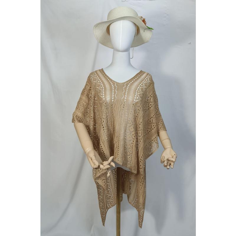 Mannequin wearing beige crochet lace kaftan tunic with V-neckline and wide sleeves, paired with white sun hat - request quote reply same day