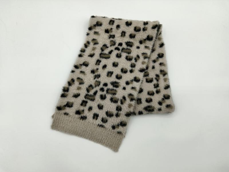 Folded beige faux fur scarf with black and brown leopard spot print pattern on white background - no MOQ for stock designs