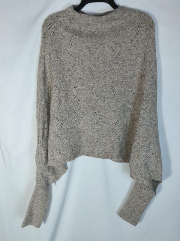 Beige cropped knit sweater with diamond pointelle pattern and long sleeves displayed on hanger - custom logo label accepted