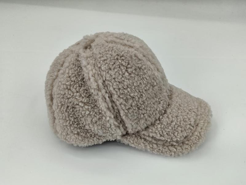 Beige sherpa fleece baseball cap with structured brim and panel seams, photographed on white background - certified scarf manufacturer China - event merchandise supplier