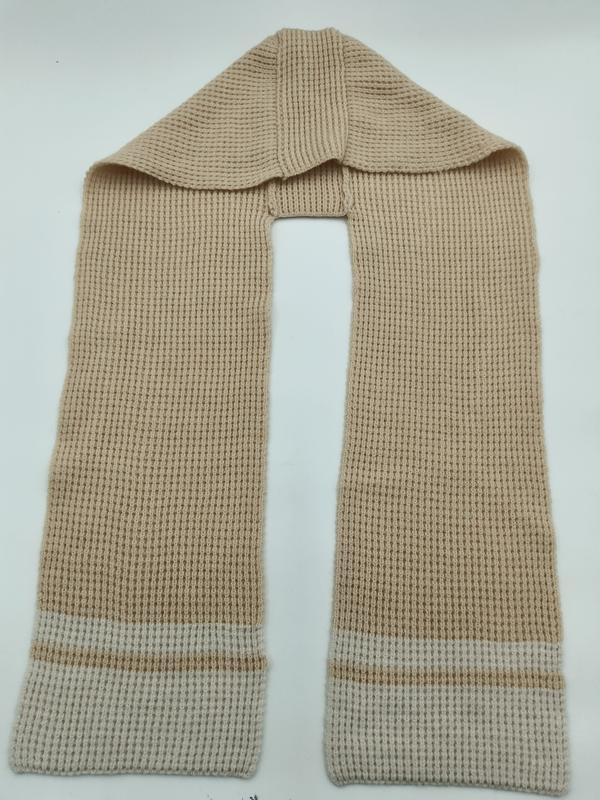 Beige waffle knit scarf with cream contrast stripe cuffs, laid flat on white background showing full length - contact for custom design quote