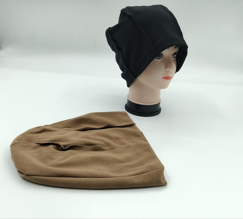 Black waffle knit slouchy beanie on mannequin head with matching brown beanie laid flat on white background - contact for custom design quote