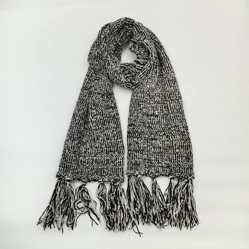 Black and white marled chunky knit winter scarf with long tassel fringe ends, looped and laid flat on white background - custom size no extra charge