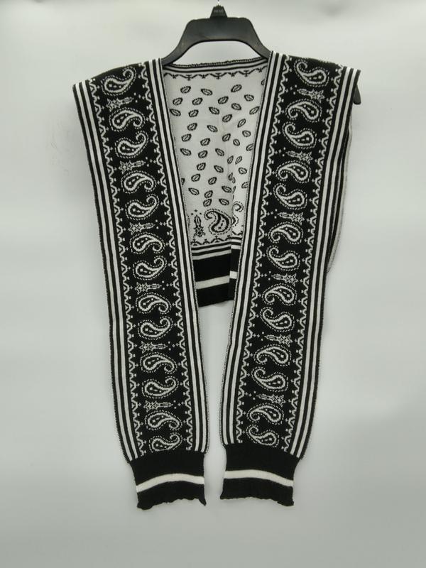 Black and white paisley patterned knit sleeveless cardigan vest with stripe trim, displayed open on hanger - retail buyer inquiry welcome - free sample within 7 days