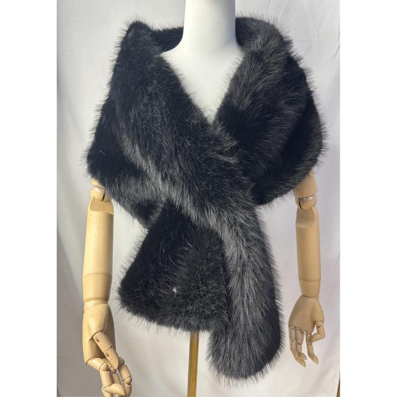 Black faux fur wrap shawl displayed on mannequin, featuring fluffy texture, silver-tipped fur and rhinestone accent - ask bulk pricing get discount