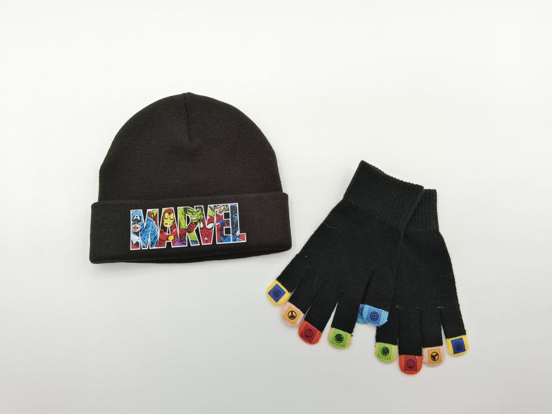 Black knit beanie hat with colorful superhero comic logo patch and matching fingerless gloves with multicolor hero icon fingertips - custom Pantone color matching