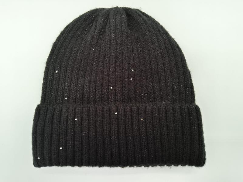 Black chunky ribbed knit beanie hat with scattered sequins and folded cuff, photographed flat on white background - custom size no extra charge