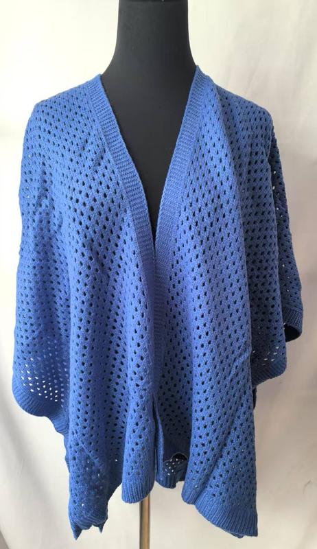 Blue open-knit cocoon cardigan wrap with eyelet pattern displayed on mannequin, featuring wide sleeves and open front - ISO 9001 quality controlled