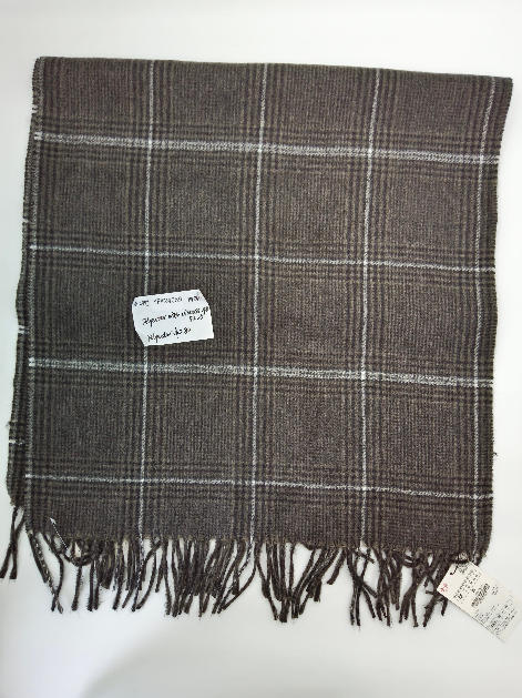 Flat lay of a brown and white glen plaid woven scarf with twisted fringe trim, polyester viscose blend - tiered pricing available ask quote