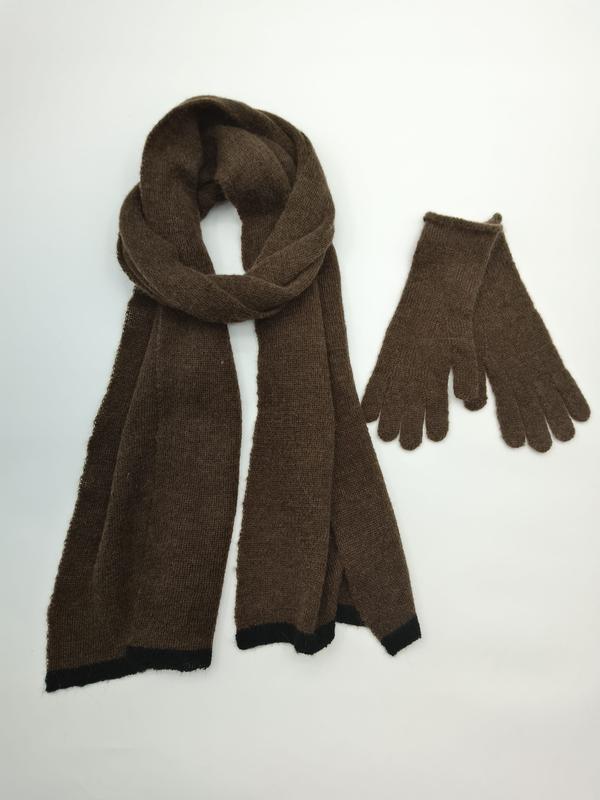 Brown knitted scarf looped and matching gloves set with black trim detail on white background - ODM OEM service available