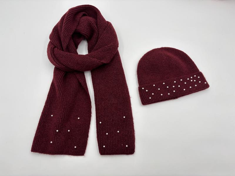 Burgundy ribbed knit winter scarf and beanie hat set with scattered pearl bead details on white background - wholesale price for Middle East buyers