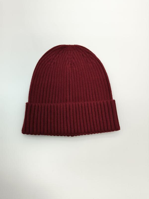 Burgundy ribbed knit beanie hat with double folded cuff laid flat on white background - factory direct price no middleman