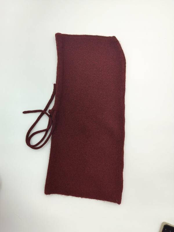 Flat lay of a dark red ribbed knit neck warmer with drawstring tie, placed on white background - custom logo label accepted