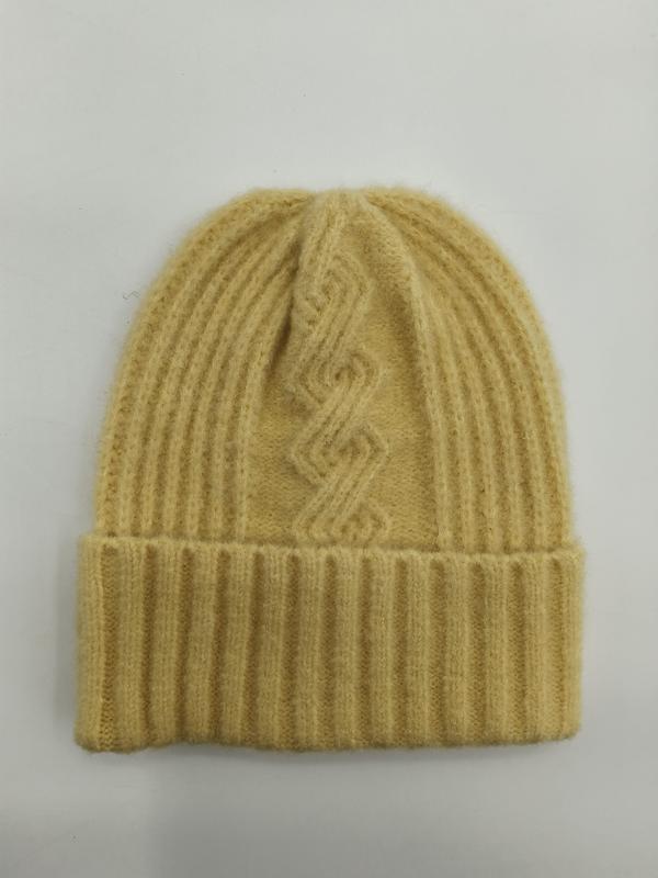 Butter yellow ribbed wool knit beanie hat with geometric cable knit pattern and folded cuff, laid flat on white background - wholesale price for USA buyers