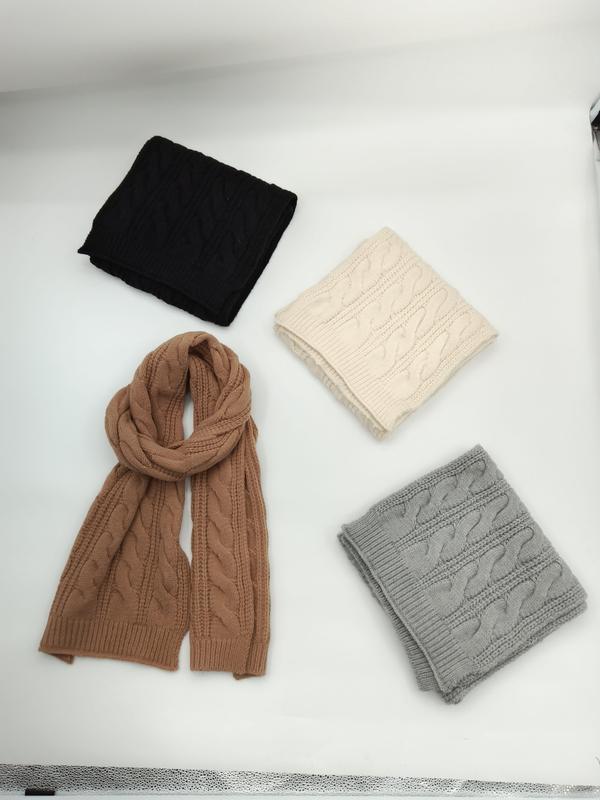 Four cable knit scarves in black, cream, camel, and gray displayed on white surface, one unfolded showing full length - ODM OEM service available - wholesale price for USA buyers