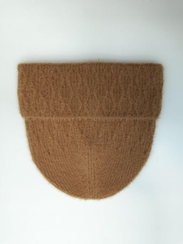 Flat lay of a camel brown fuzzy ribbed knit beanie hat with folded cuff on white background - ask bulk pricing get discount