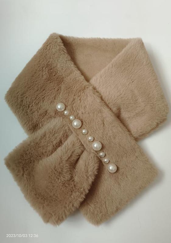 Soft camel faux fur crossover neck scarf decorated with a diagonal row of mixed-size pearl buttons on white background - certified scarf manufacturer China - event merchandise supplier