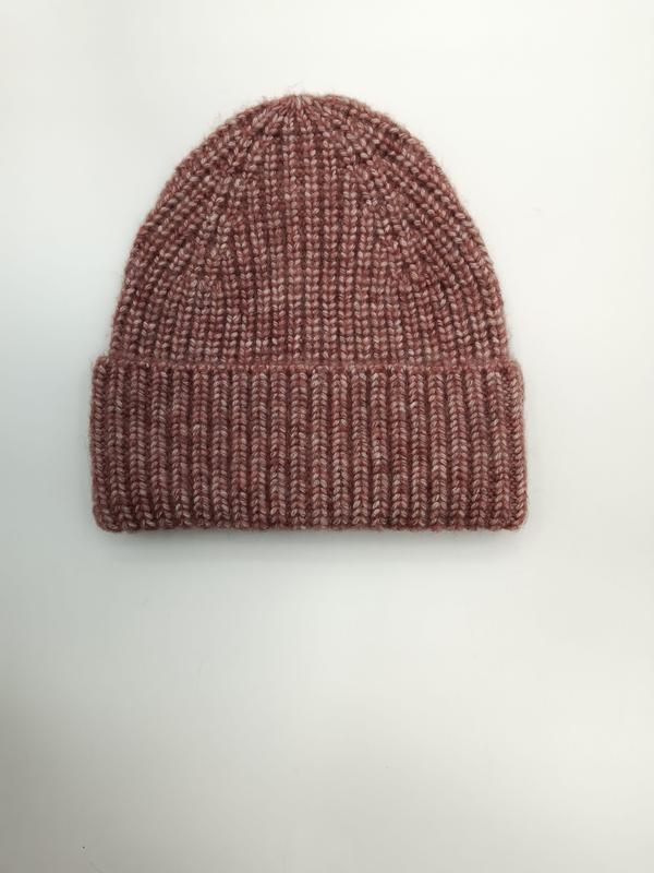 Flat lay of a dusty rose marl chunky ribbed knit beanie hat with folded cuff on white background - gift shop wholesale supplier