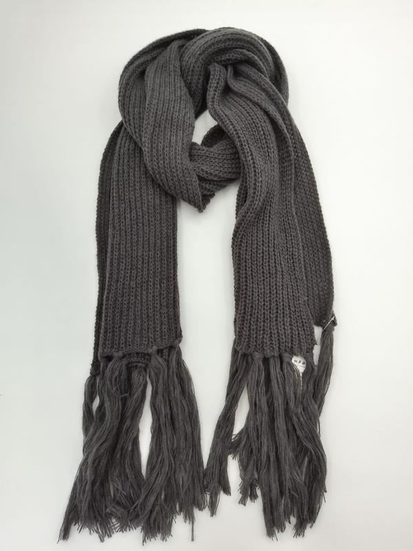 Dark gray chunky ribbed knit winter scarf with long fringe tassels displayed folded on white background - custom logo label accepted