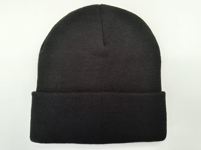 Plain black ribbed knit beanie with folded cuff, laid flat on white background, unisex winter hat - certified scarf manufacturer China - custom packaging design free
