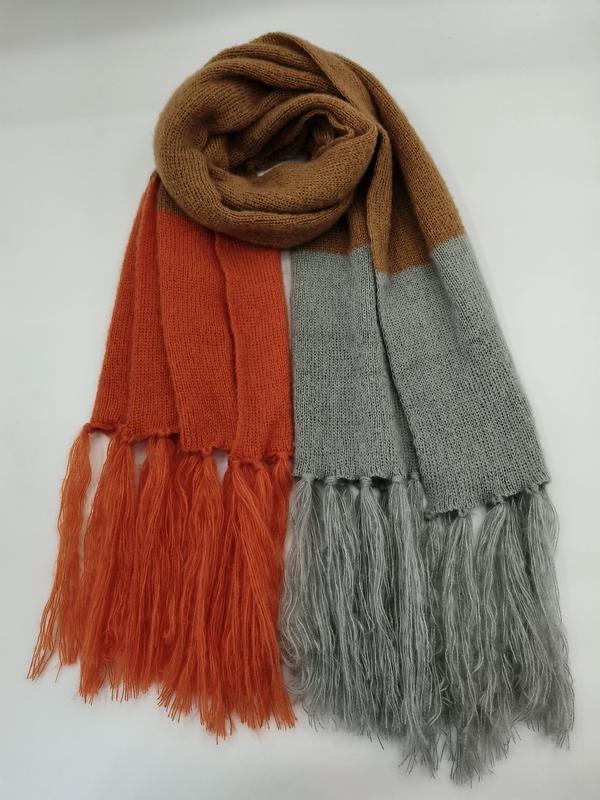 Color block knit scarf in rust orange, grey, and camel with long fringe ends, laid flat on white background - bulk order 20-day delivery