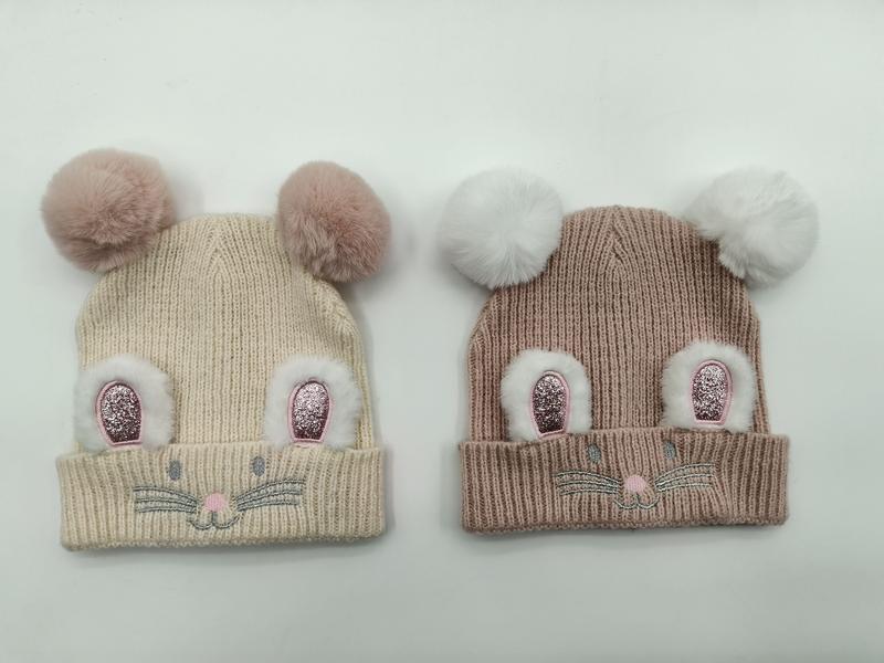 Two children's ribbed knit beanies in cream and taupe with fluffy double pom pom mouse ears and embroidered face detail - wholesale price for Europe buyers