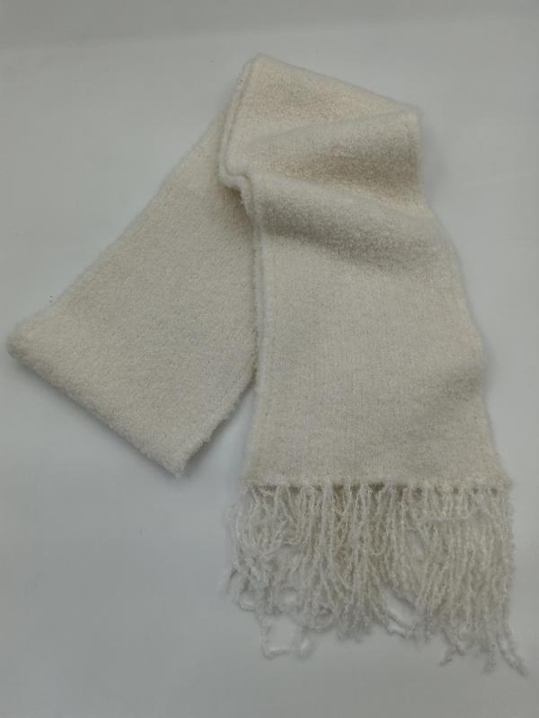 Soft cream boucle knit scarf folded on white background, showing textured fabric and knotted fringe ends - sample order 10pcs available