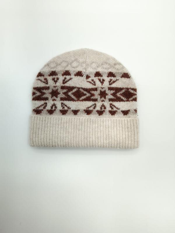Cream knitted beanie hat with rust brown Fair Isle Nordic geometric snowflake pattern and ribbed cuff, flat lay on white background - email us get price list now