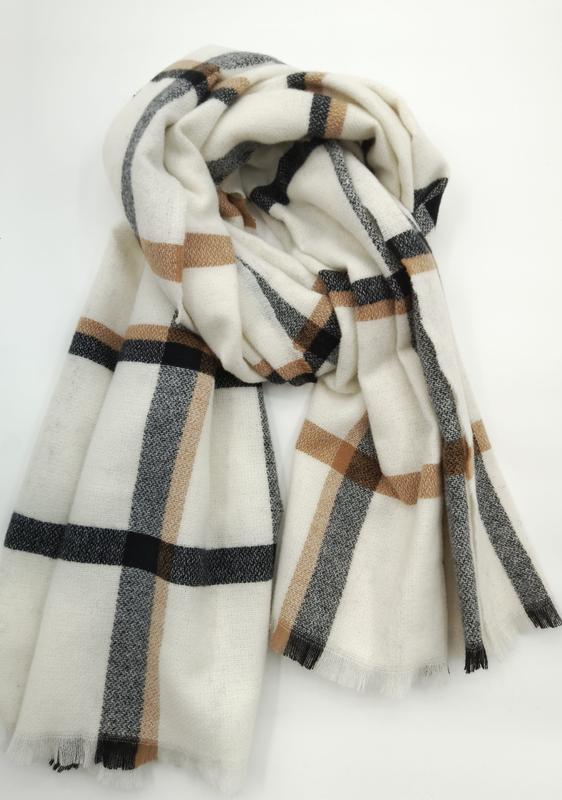 Cream white oversized blanket scarf with black and camel brown plaid check pattern, folded and draped on white background - custom logo label accepted