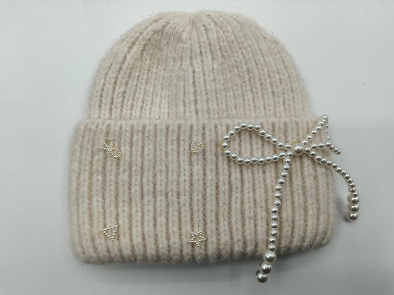 Cream ribbed knit winter beanie hat with decorative pearl bow and small rhinestone motifs on the cuff - custom Pantone color matching