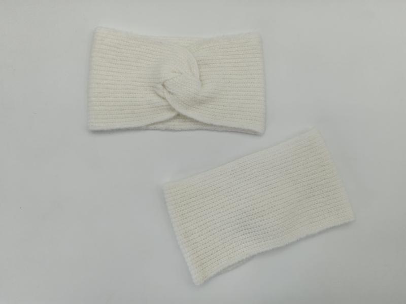 Cream ribbed knit twisted turban headband and matching wrist warmer set laid flat on white surface - MOQ 100pcs mixed colors OK