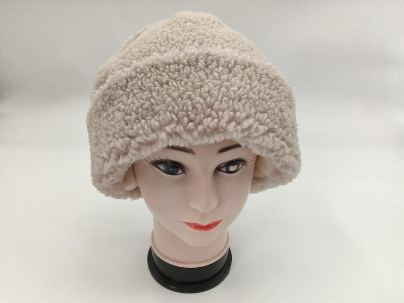Cream off-white sherpa fleece bucket hat displayed on a female mannequin head against white background - express production 15 days