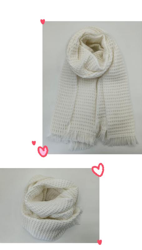 Cream waffle knit scarf with fringe edges, shown draped and looped, ivory textured winter wrap accessory - event merchandise supplier