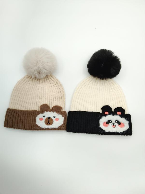 Two ribbed knit beanies with pom-poms featuring bear and panda cartoon faces on brown and black contrast cuffs - 5-day digital sample ready