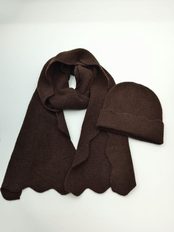 Dark chocolate brown ribbed knit winter scarf with scalloped hem and matching beanie hat set on white background - event merchandise supplier