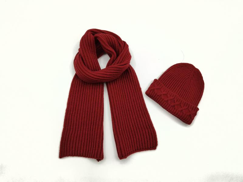 Dark red ribbed knit scarf looped beside a matching cable knit beanie hat on white background - small batch 100pcs accepted