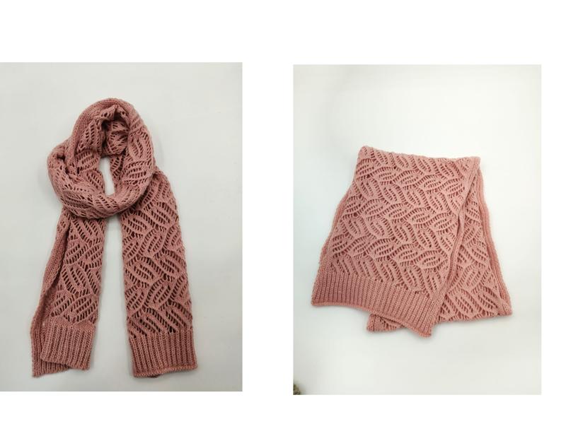 Dusty rose knit scarf with open lace leaf pattern shown draped and folded, featuring ribbed ends - EU REACH compliant material
