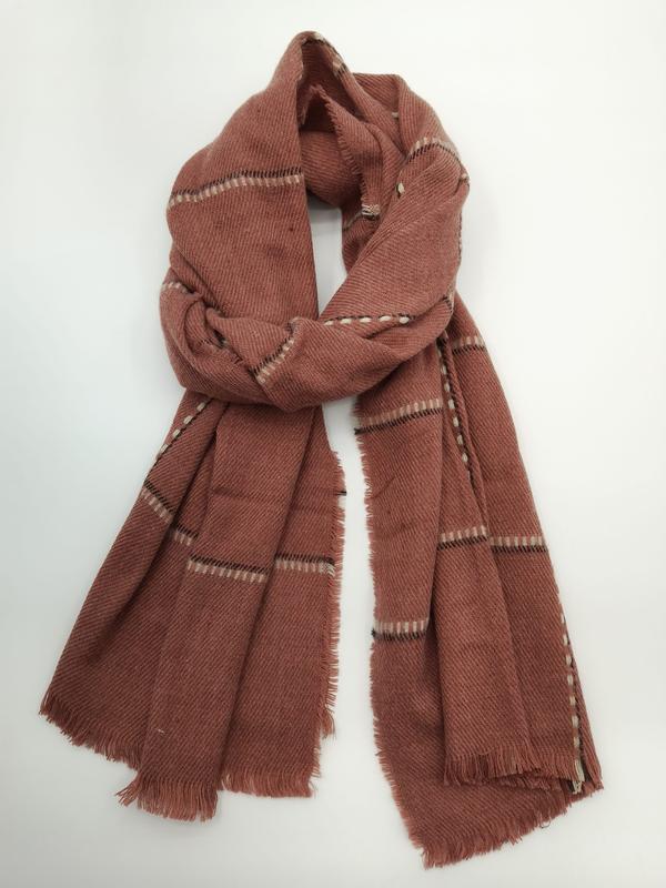 Dusty rose plaid wool blend scarf with cream and black stripes, fringe edges, loosely knotted on white background - ask bulk pricing get discount