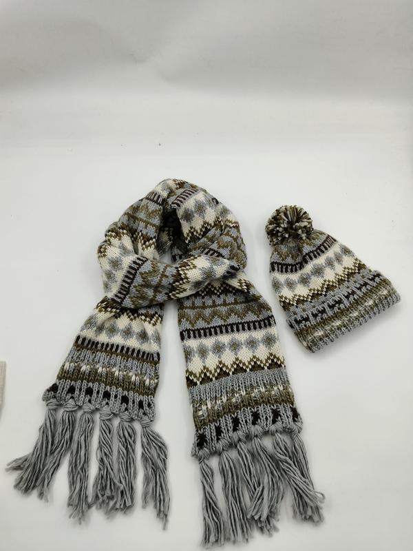 Gray and brown Fair Isle patterned knit scarf with fringe tassels and matching pom-pom beanie hat set on white background - ISO 9001 quality controlled