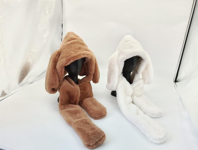 Two fluffy faux fur hooded scarf hat sets with long bunny ears in brown and white displayed on mannequin heads - custom logo label accepted