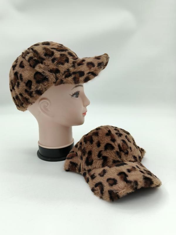 Two faux fur leopard print baseball caps in tan and brown, one displayed on mannequin head and one laid flat - email us get price list now