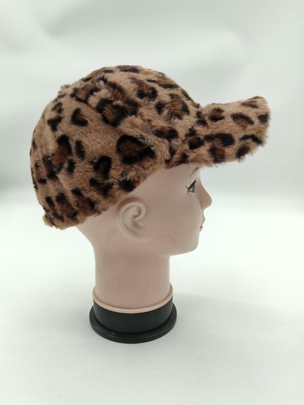 Leopard print faux fur baseball cap displayed on a mannequin head, side profile view, beige and brown animal pattern - request quote reply same day