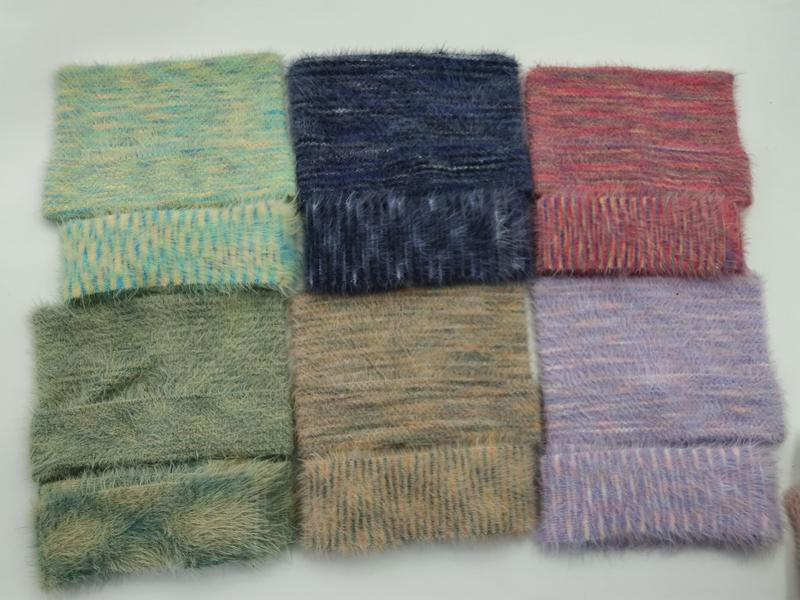 Six square fabric swatches with soft fluffy brushed texture in teal, navy, red-pink, sage green, tan, and lavender multicolor - private label service available