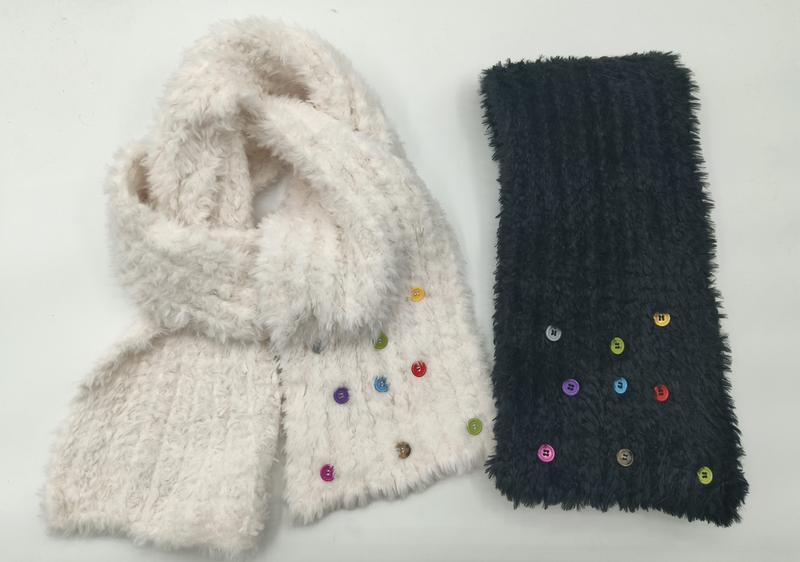Two fuzzy knit scarves with multicolor buttons, one cream white and one navy blue, displayed flat on white background - contact for custom design quote