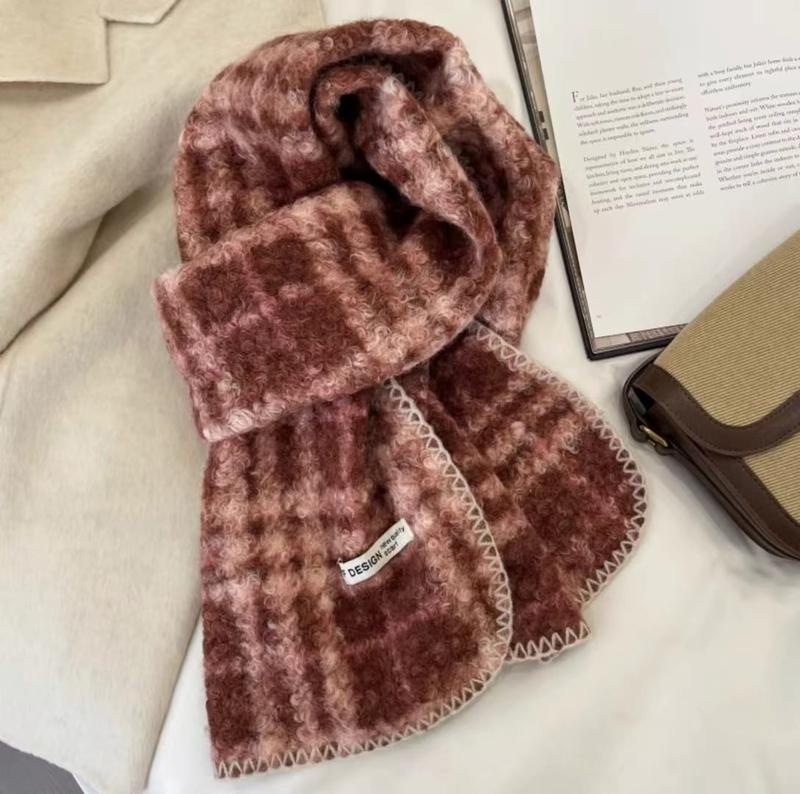 Cozy rose pink and burgundy plaid mohair blend scarf with cream blanket stitch edges, styled with a book and handbag - private label service available