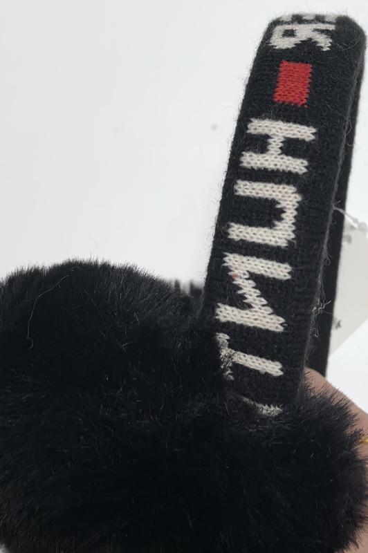 Gray fluffy faux fur earmuffs with tan suede-style headband displayed flat on white background with product tag - no MOQ for stock designs