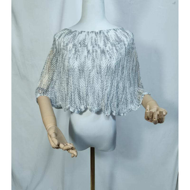 Gray and white open-knit lace crop poncho cape displayed on a mannequin with wooden artist hands, scalloped hem detail - certified scarf manufacturer China - bulk order 500+ pcs extra 8% off