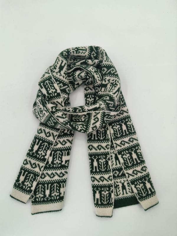 Folded green and cream knitted scarf with Fair Isle Nordic geometric pattern on white background - wholesale price for USA buyers