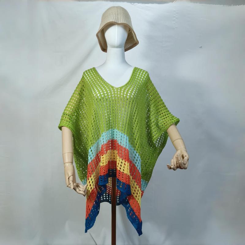Mannequin wearing green crochet open-knit poncho with rainbow chevron hem and beige bucket hat, beach cover-up - custom packaging design free