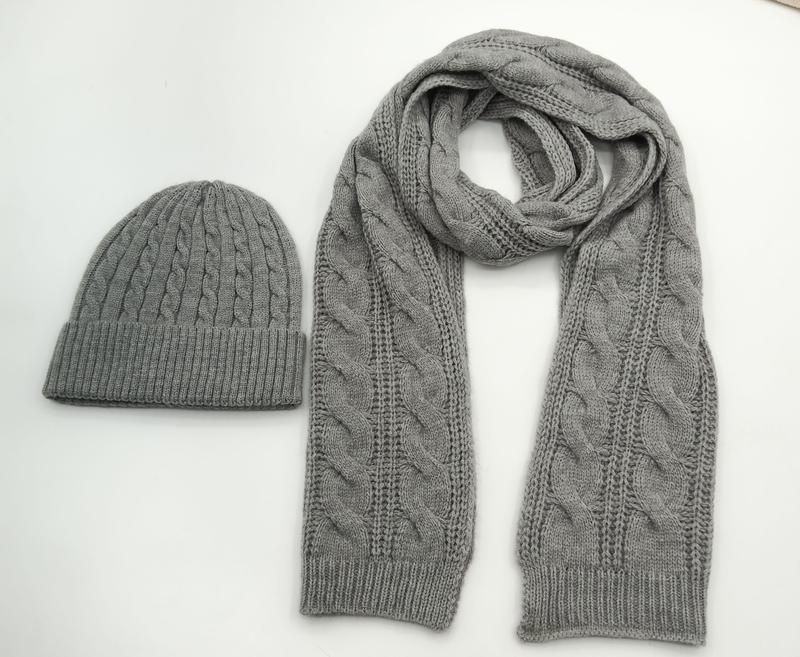 Grey cable knit matching winter beanie hat and long scarf set laid flat on white background - Oeko-Tex Standard 100 certified